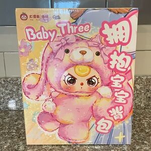 Sealed NIB Baby Three 400% Huggable Backpack
